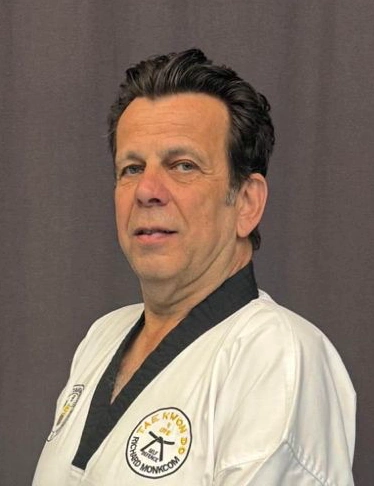 Mr Richard Monkcom